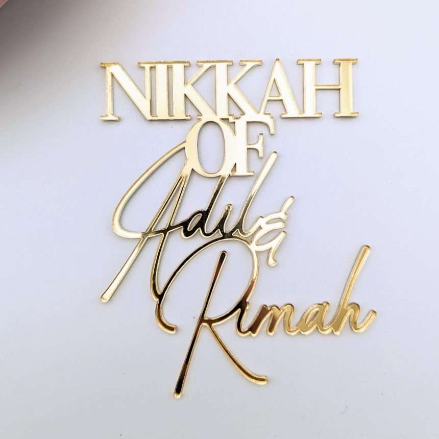 Personalised acrylic nikkah name cake charm in gold.